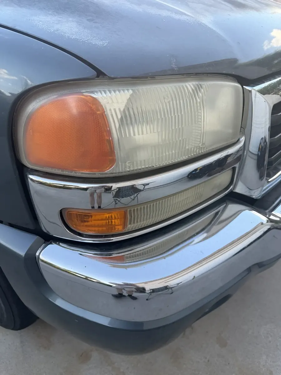 GMC headlight before restoration